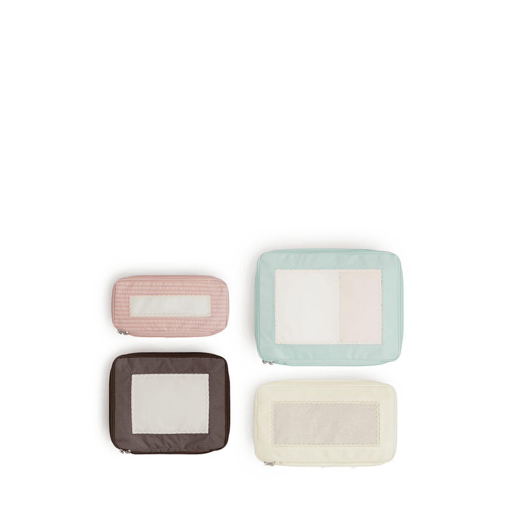 Monos × Reformation Compressible Packing Cubes